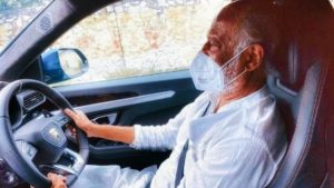 Superstar Rajinikanth drives a Lamborghini wearing face mask and the pictures flood the internet! View pics