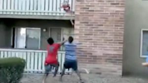 Football player hailed a hero after catching baby from 30-feet above ground thrown by mom from a burning building